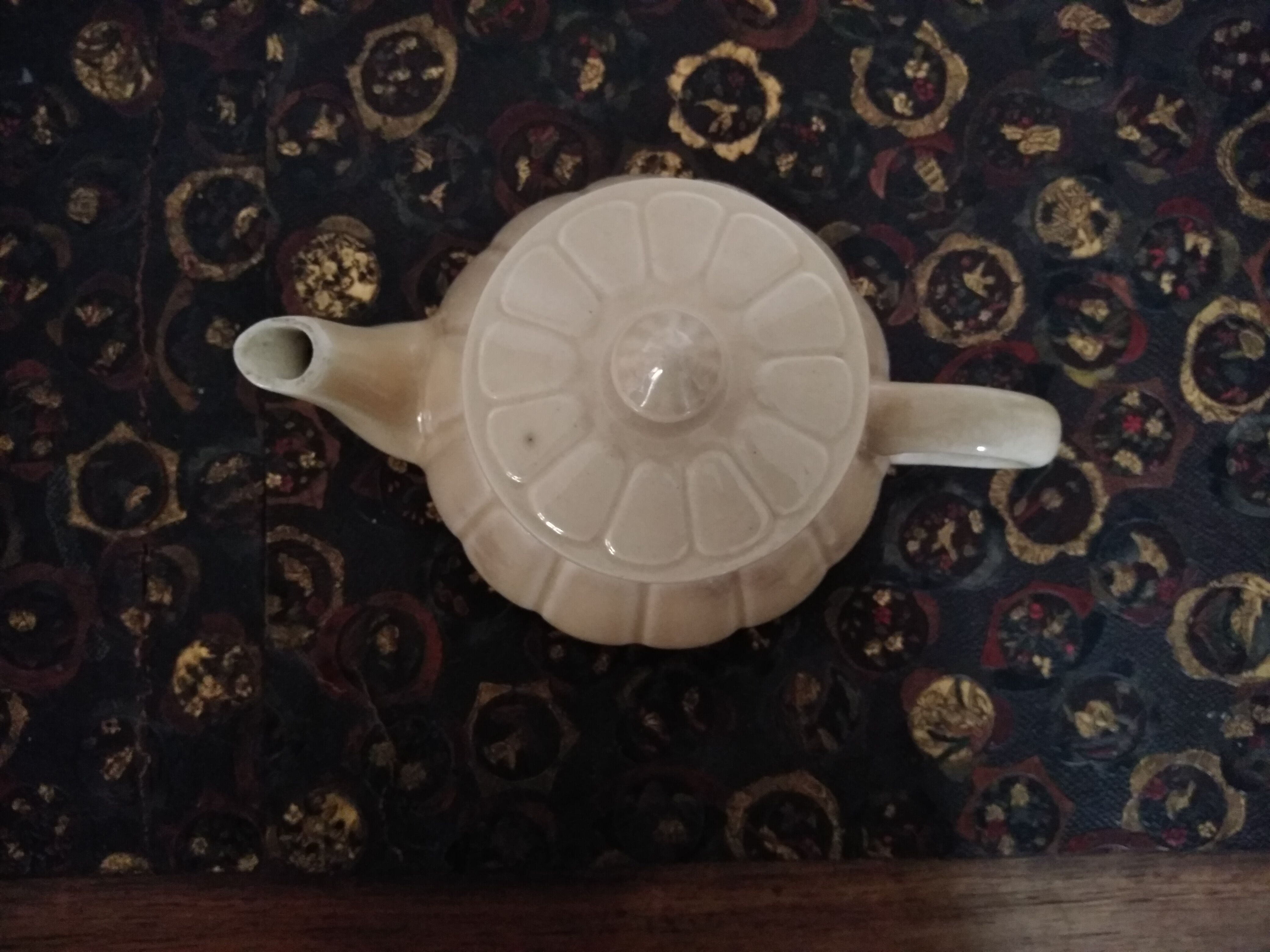 Cream-colored teapot