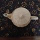 Cream-colored teapot