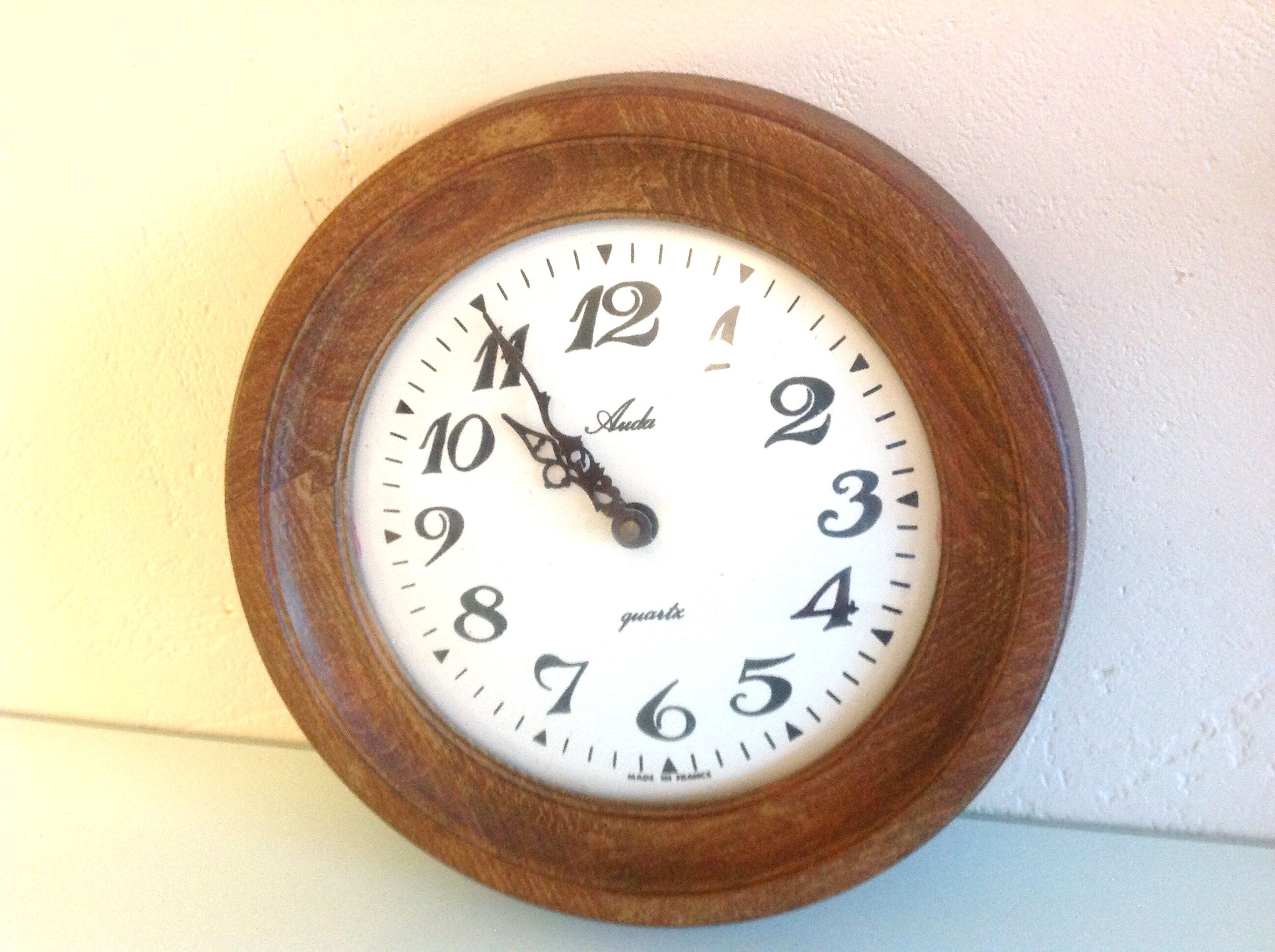 Old round wooden clock, vintage 70