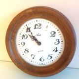 Old round wooden clock, vintage 70