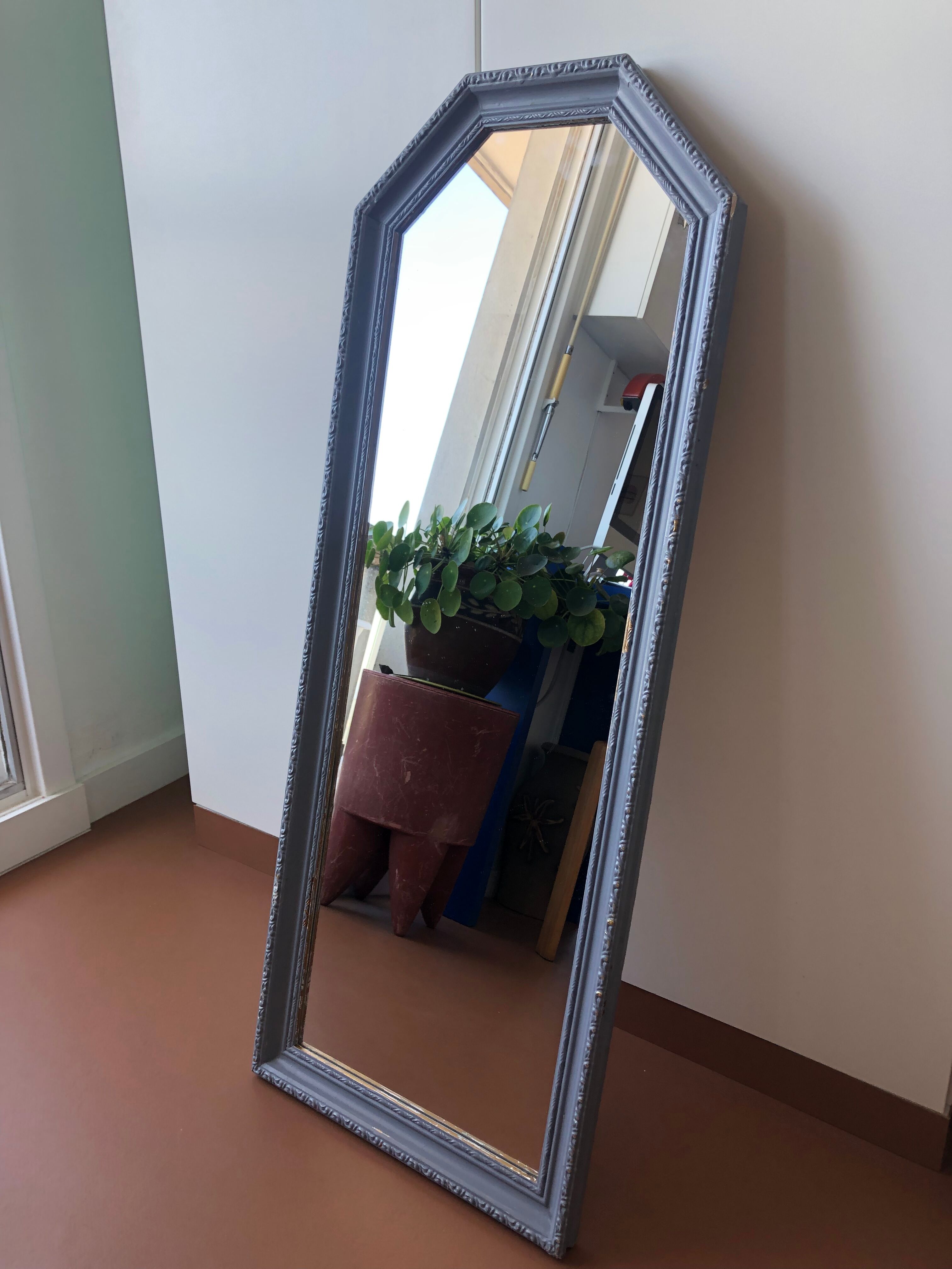 Old patinated mirror golden gray