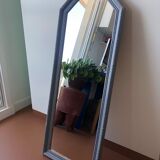 Old patinated mirror golden gray