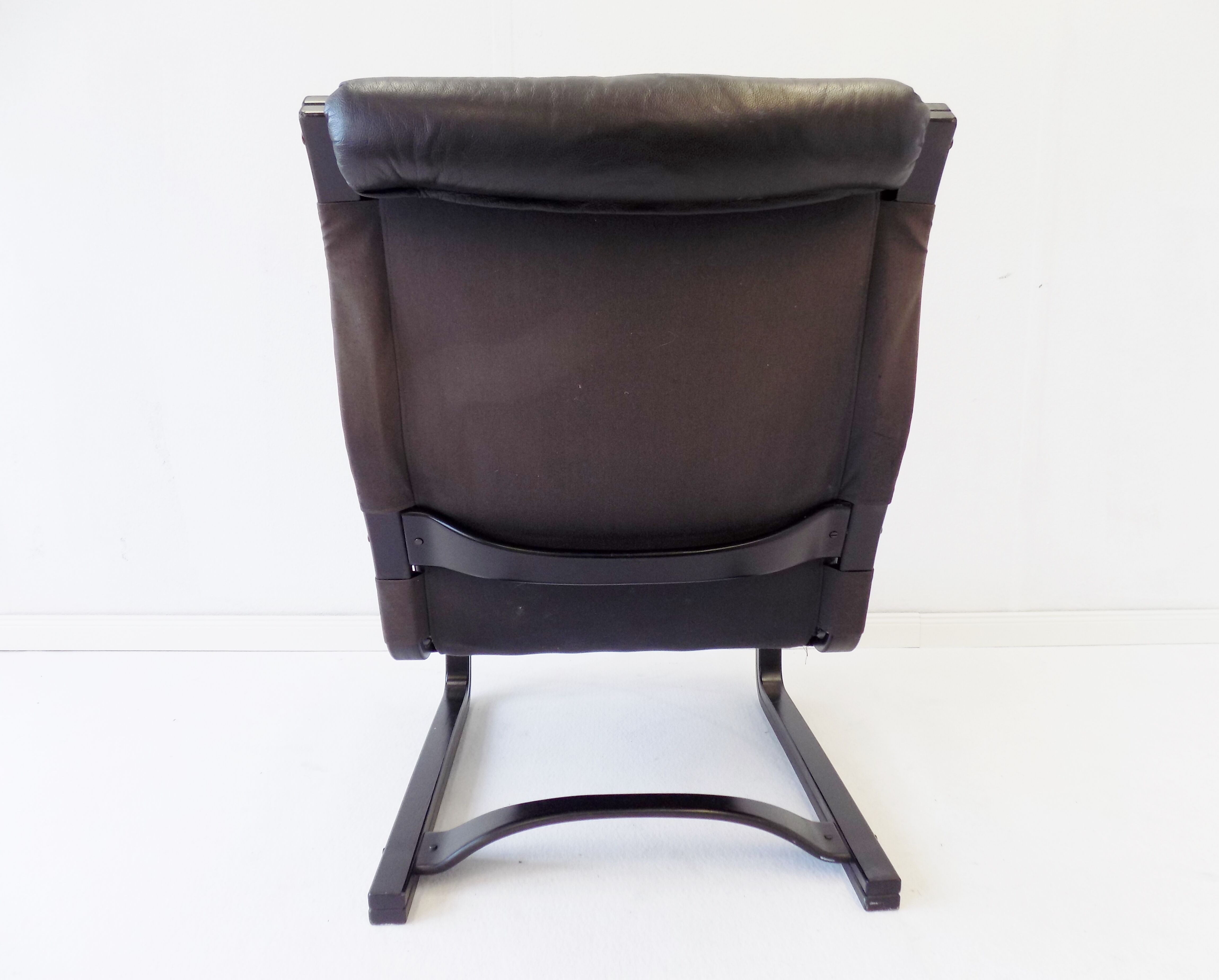 Asko Koivutaru black leather armchair by Esko Pajamies