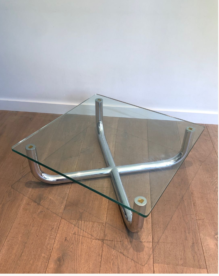 Chrome coffee table with a glass top