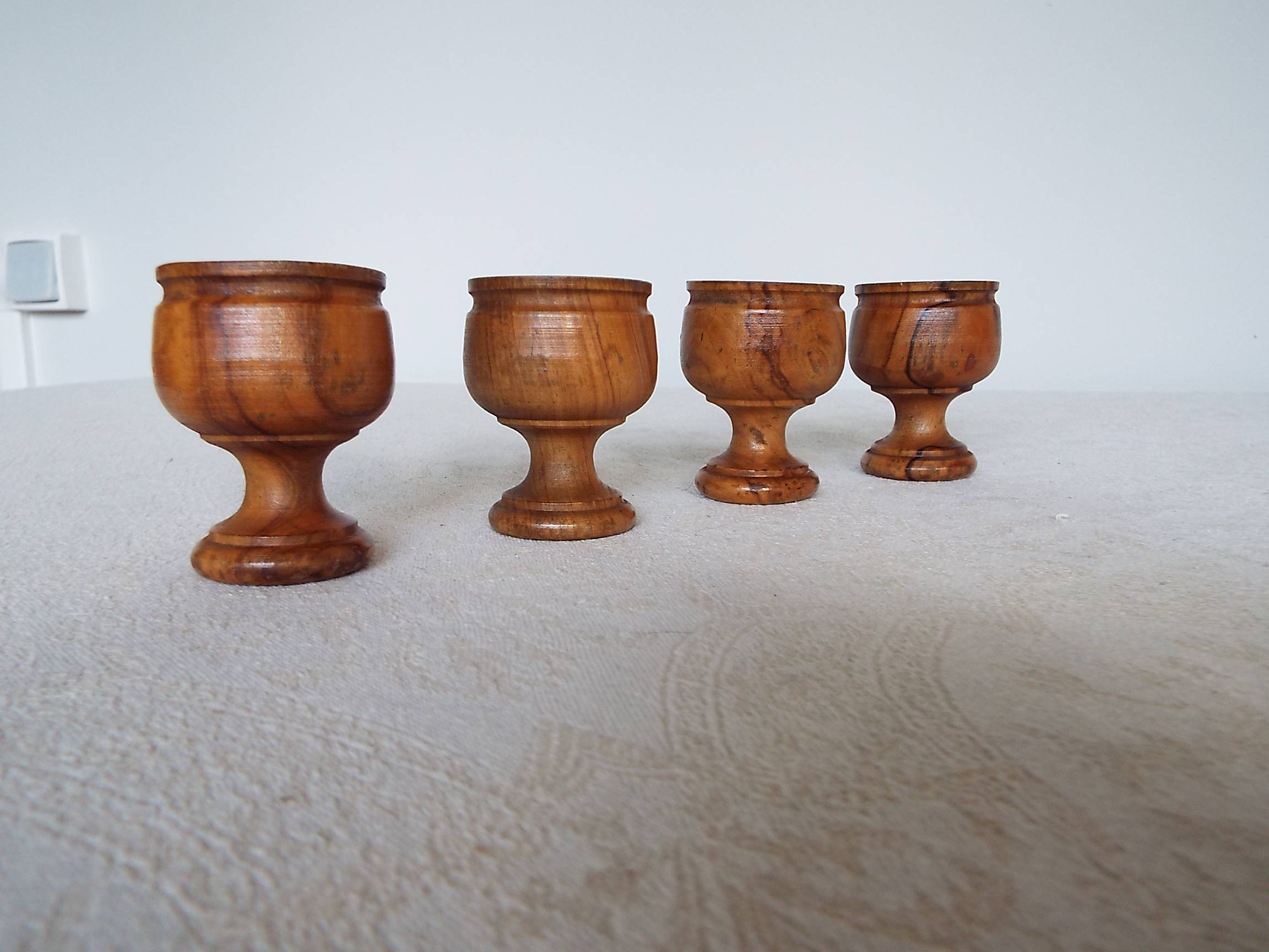 4 wooden cockroaches