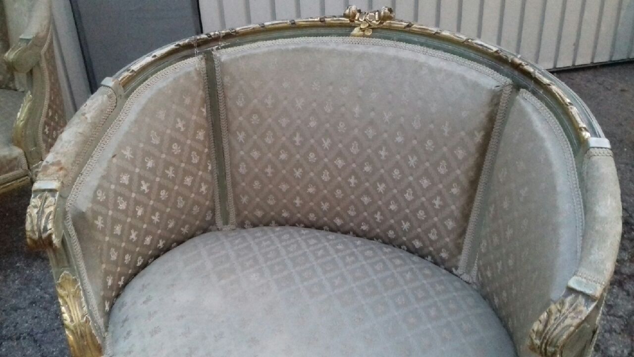 Golden lounge two armchairs and a gondola-shaped sofa and a pair of Louis XVI chairs