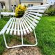 Antique garden bench with metal legs