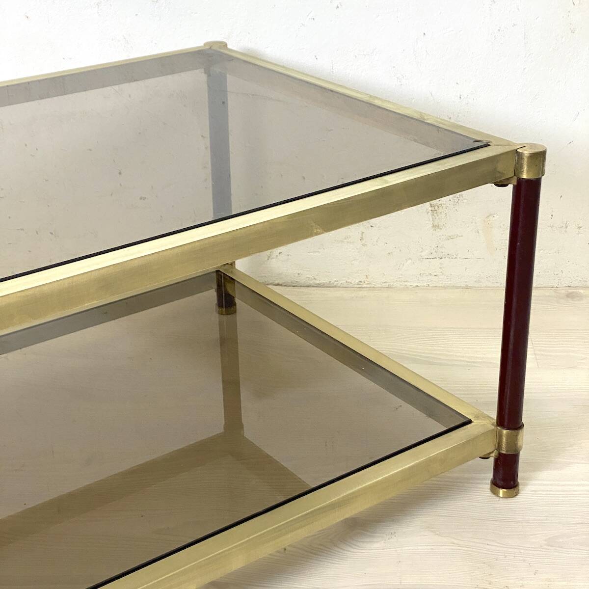 Vintage 1970s gold metal and smoked glass coffee table.
