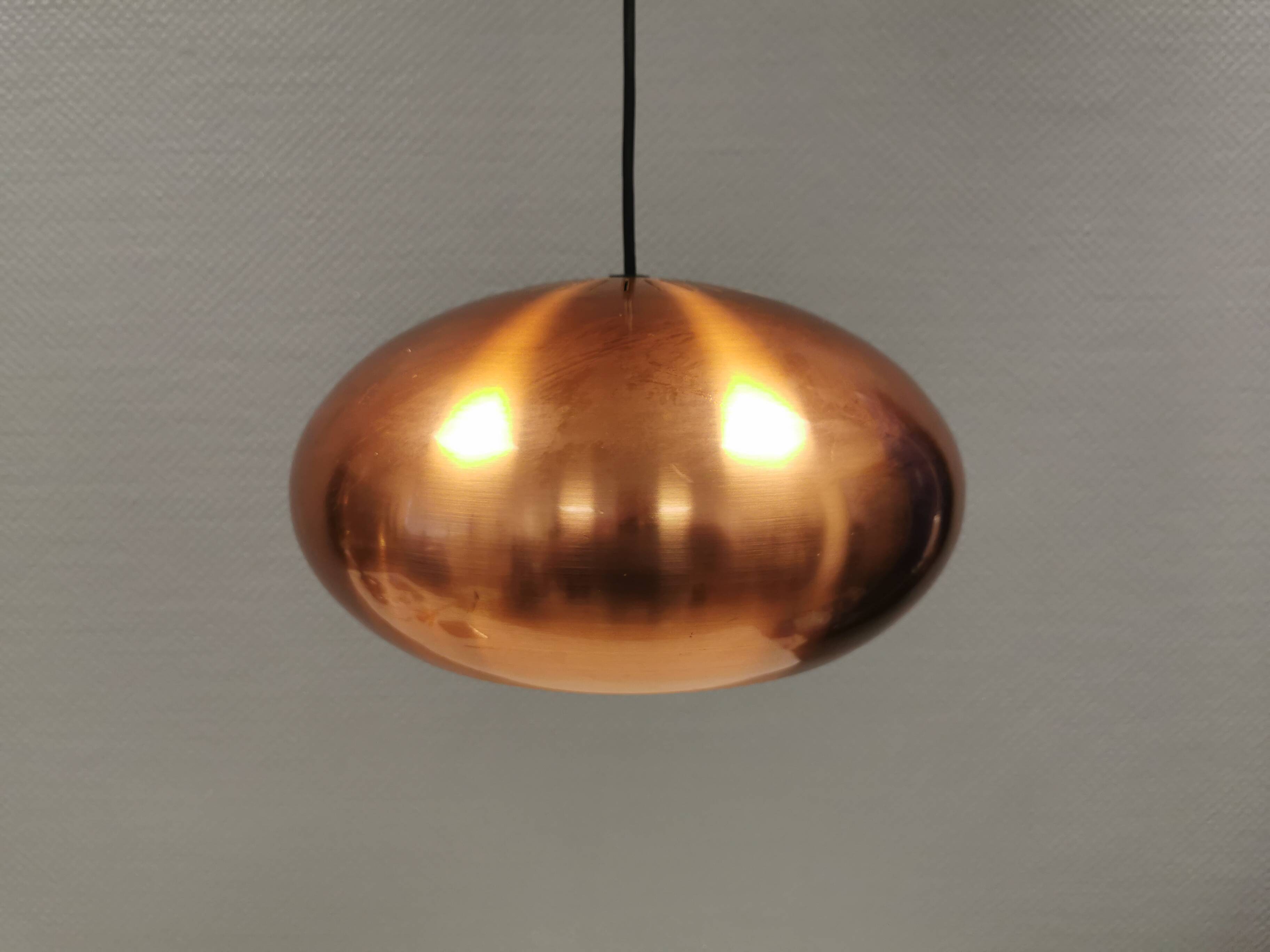 Top-class designer lamp model Medio in metal copper color