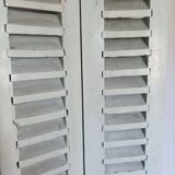 Louvered wooden shutter