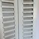 Louvered wooden shutter