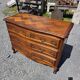 Curved commode in Louis XV style made of cherry wood.