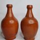 Pair of glazed terracotta jars, 26 cm