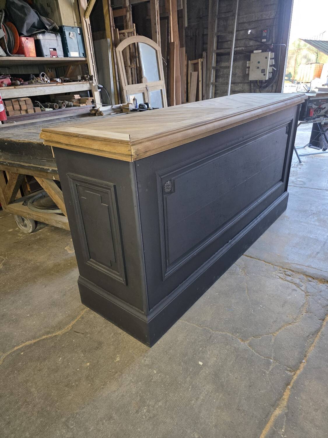 Chevron-patterned oak workbench