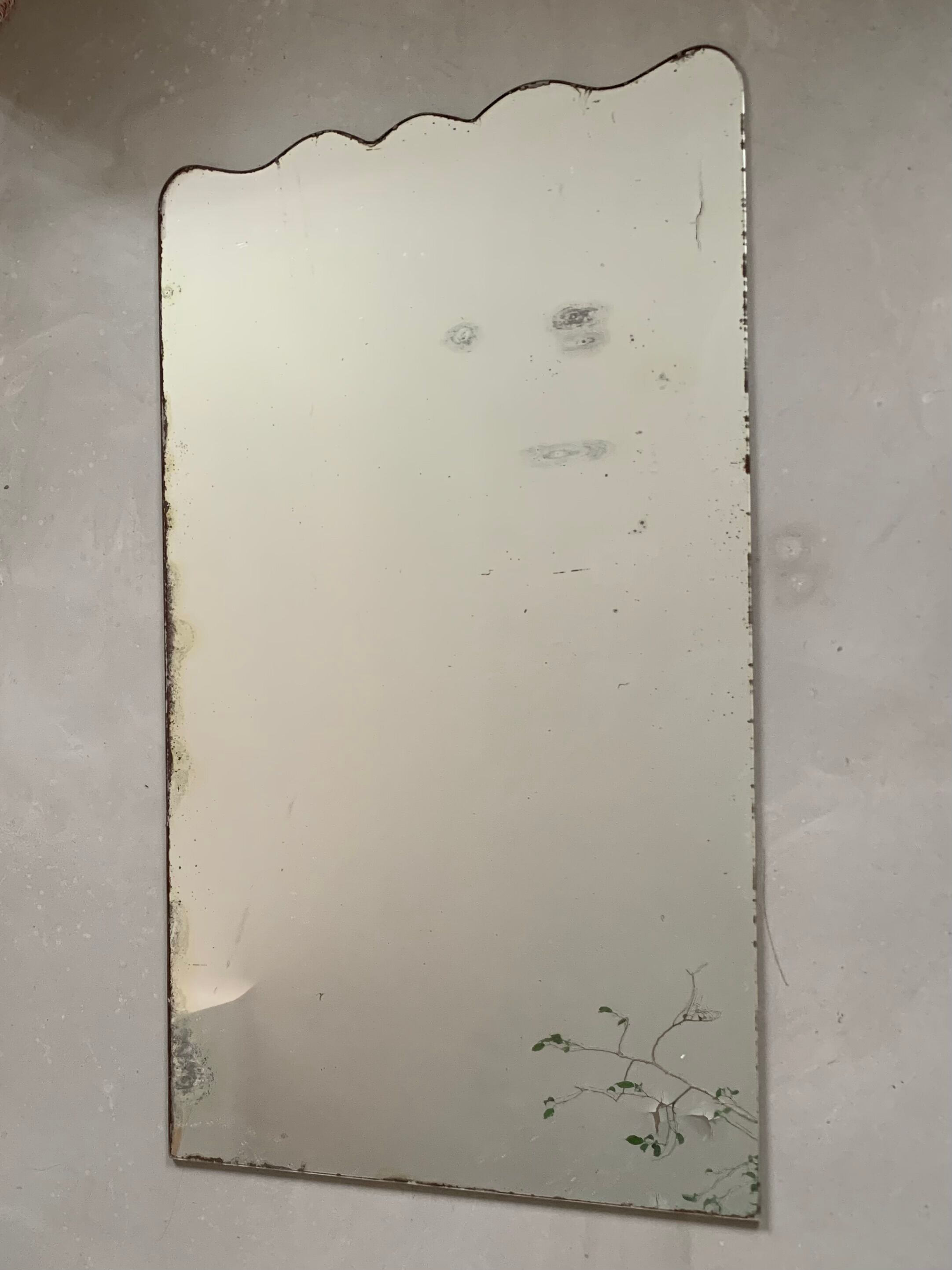 Miroir ancien piqué