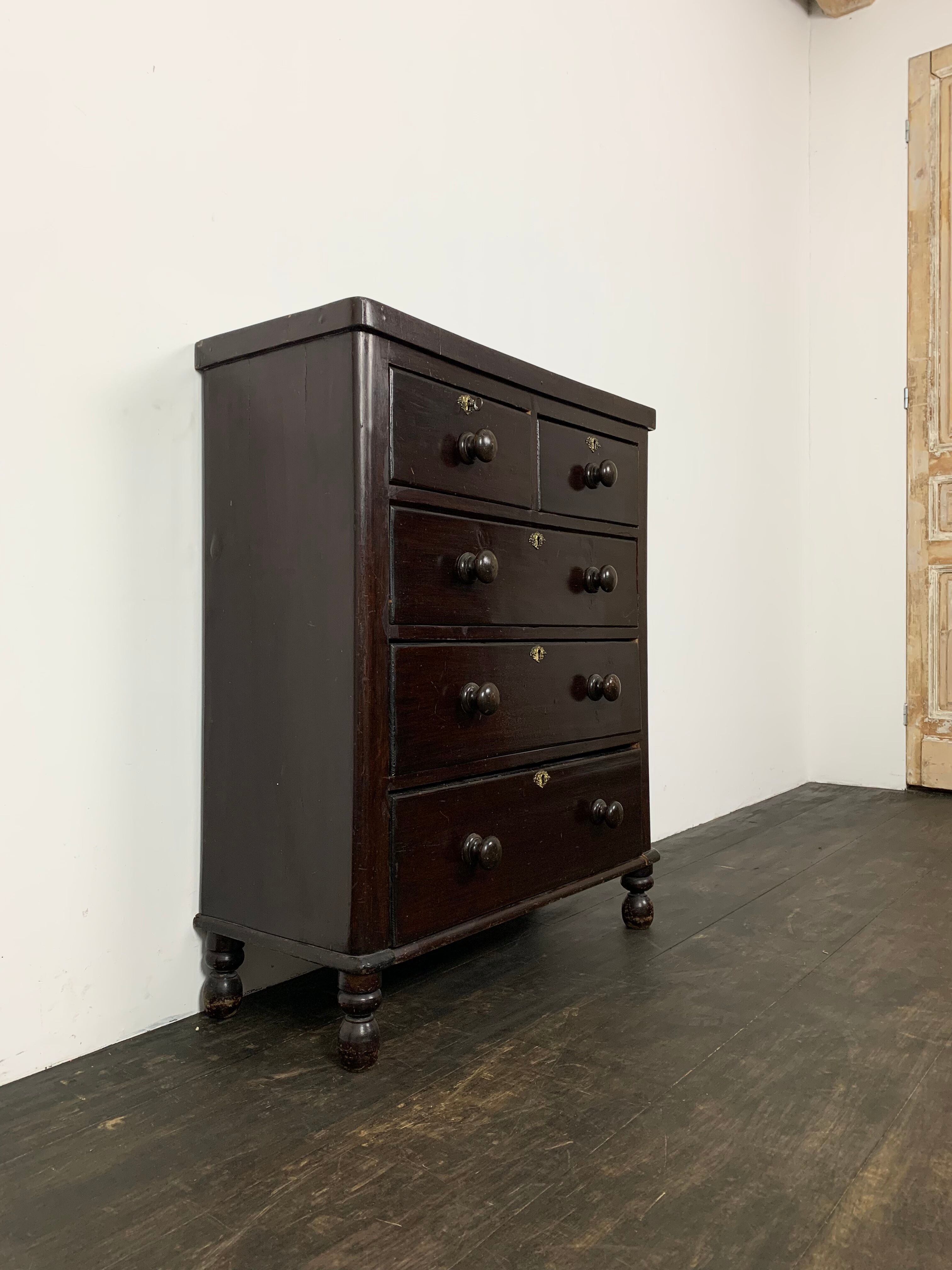 Dark antique chest of drawers