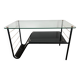 Metal and glass coffee table with magazine rack by Roche Bobois from the 1950s.