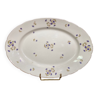 Oval-shaped dish in Limoges porcelain decorated with barbels Louis XV style