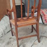 Mulched armchair of golden rye in solid walnut period Restoration around 1820