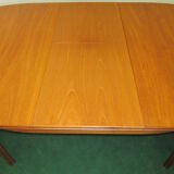 Teak dining table, an extension