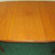 Teak dining table, an extension