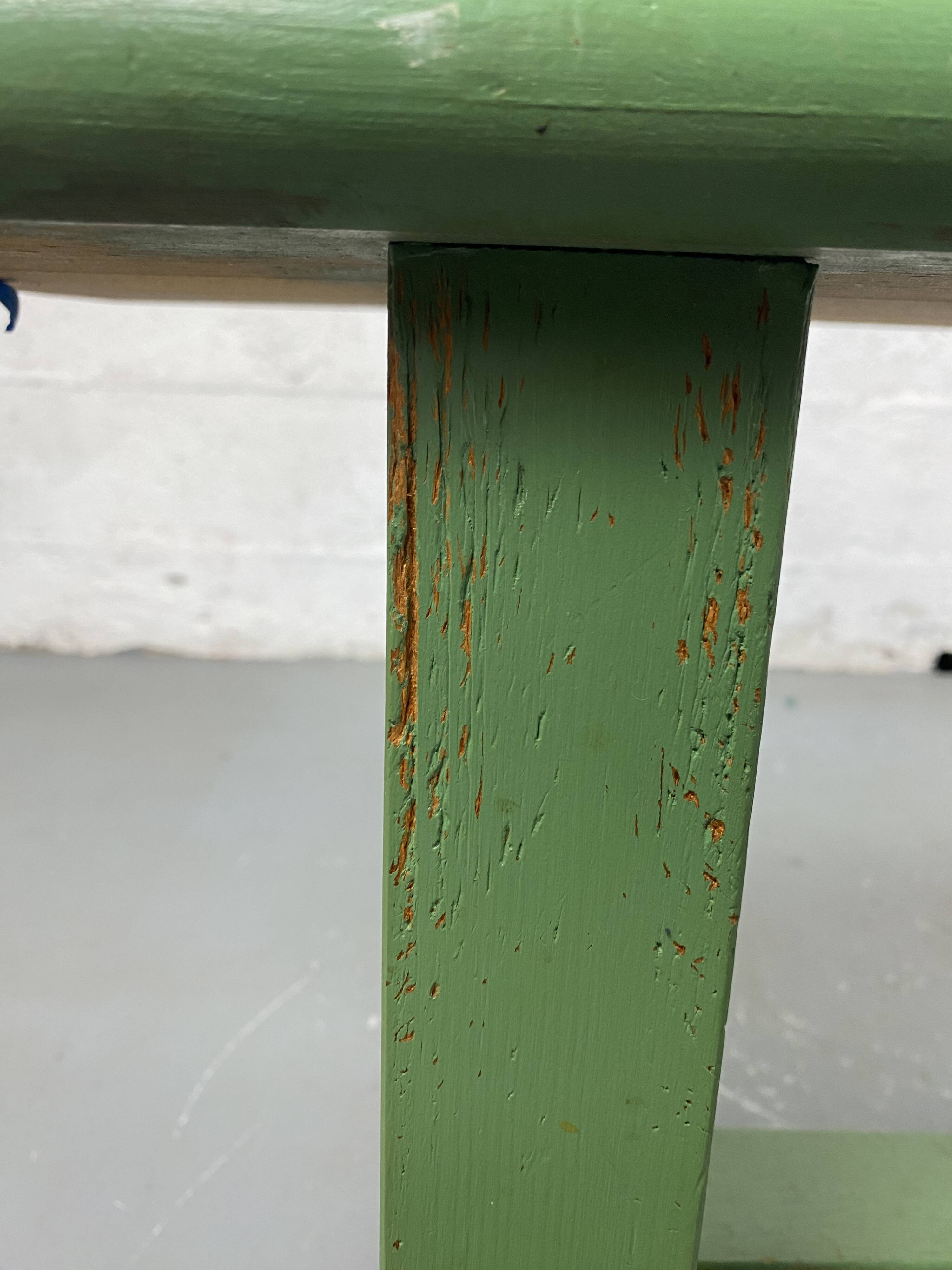 Green wooden bench