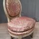 Chaise basse de style Louis XVI