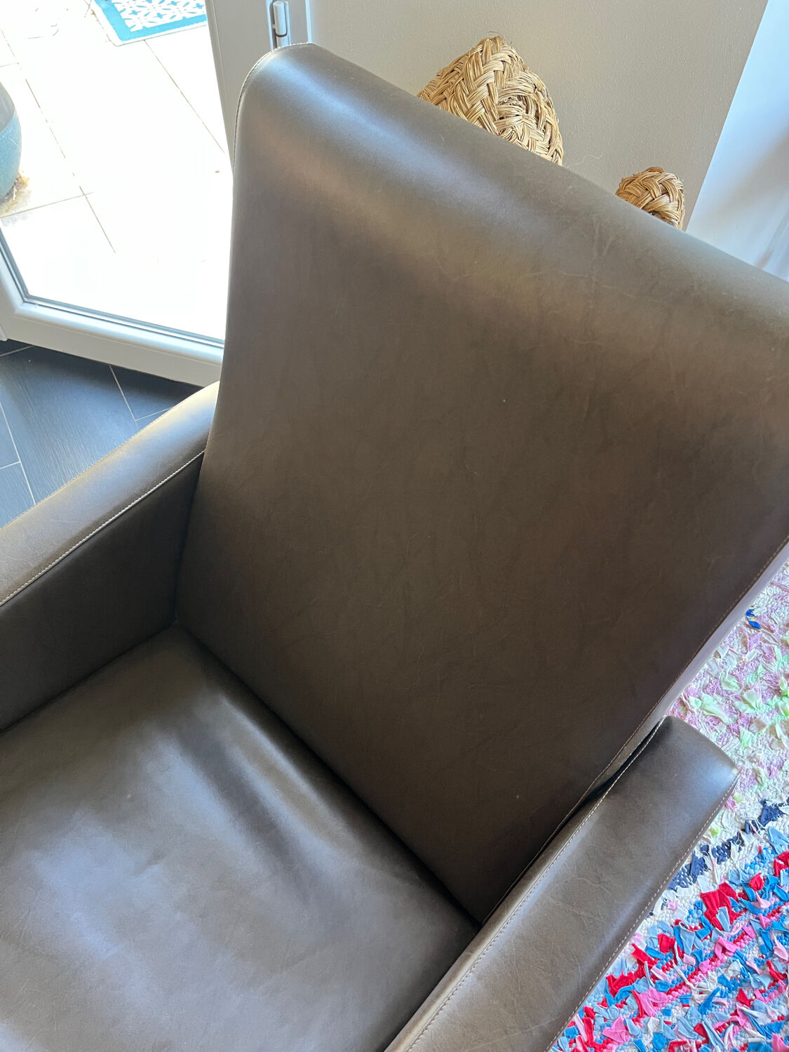 Vintage brown faux leather armchair from the 60s/70s.