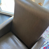 Vintage brown faux leather armchair from the 60s/70s.