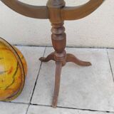 Old terrestrial globe world map on wooden stand
