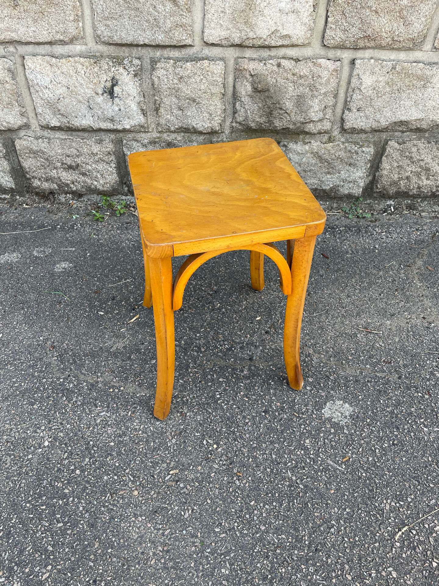 Curved wood stool in Baumann style