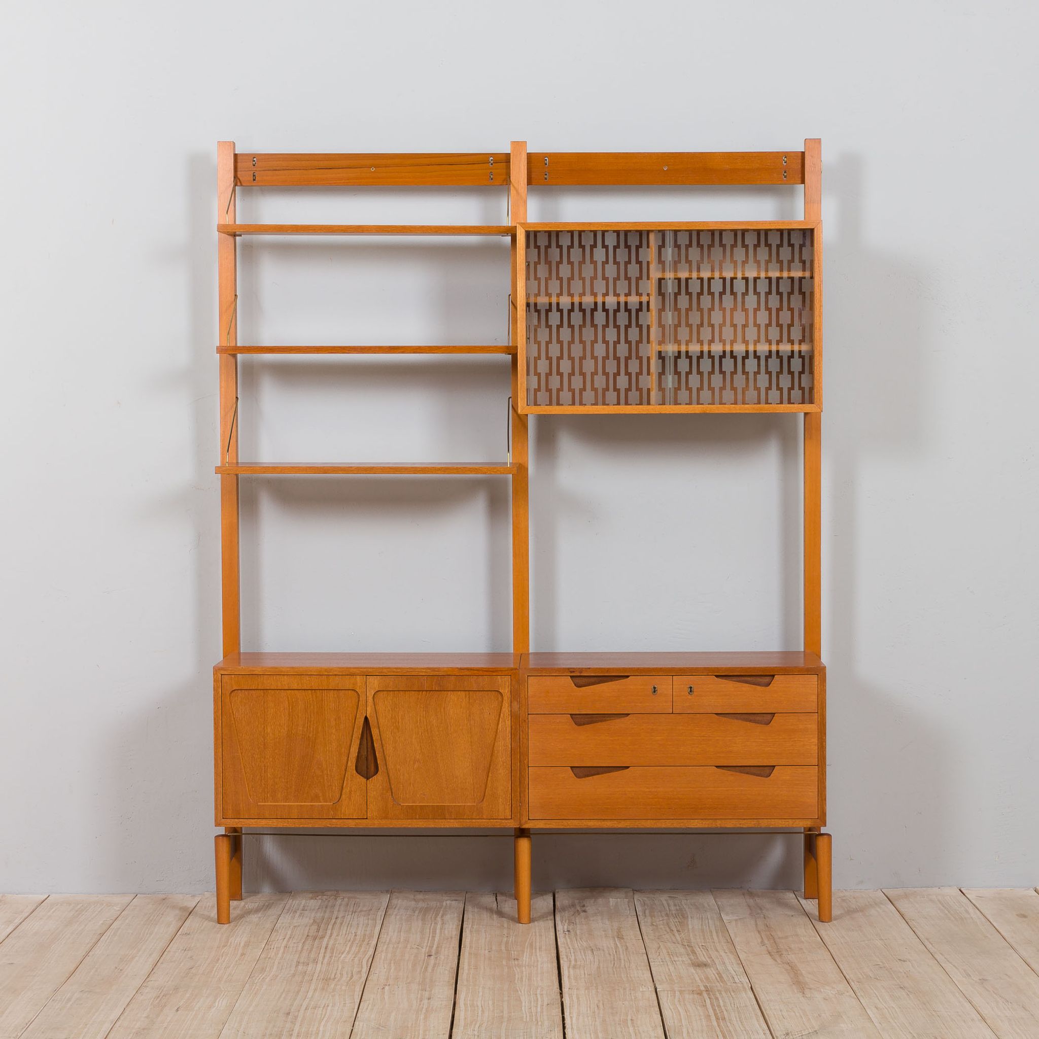 Rival 2 bay free standing teak wall unit with 3 cabinets and 3 shelves by Brodrene Jatogs Norway, Kj