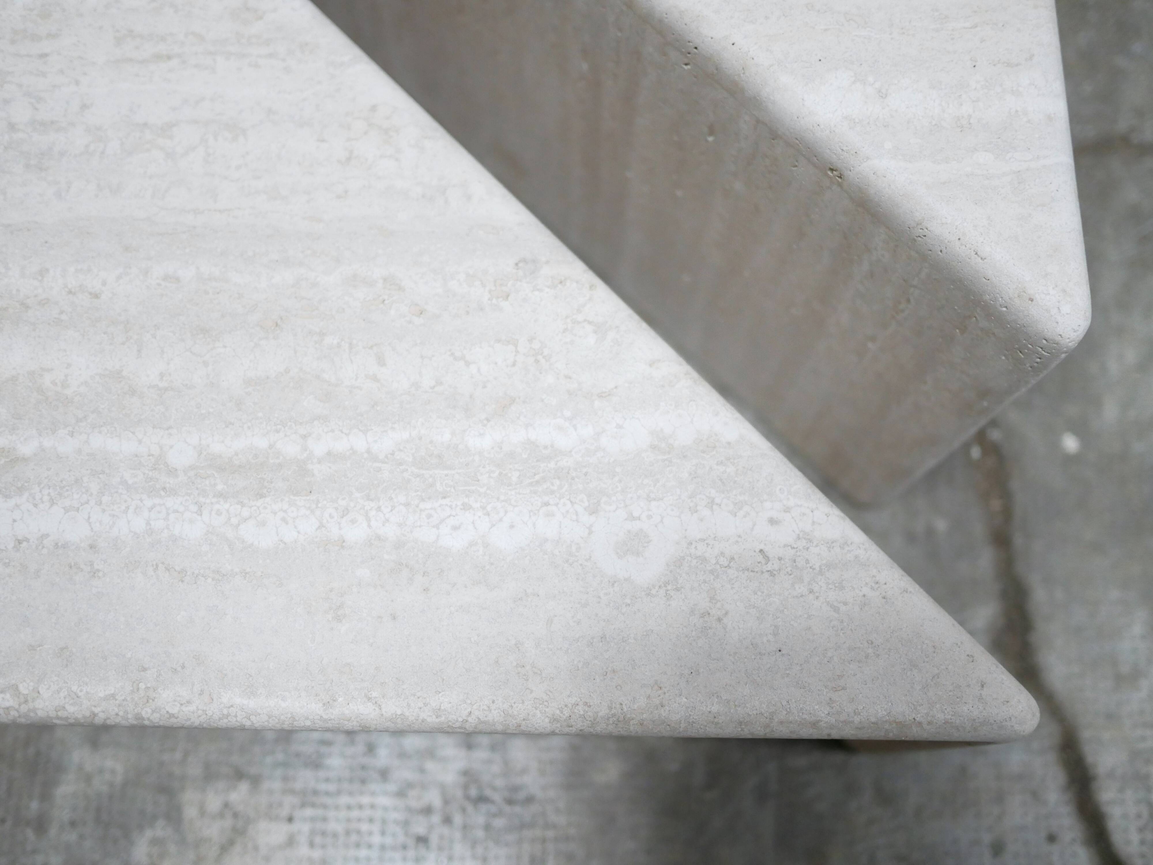 Vintage travertine coffee table published by Roche Bobois