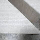 Vintage travertine coffee table published by Roche Bobois