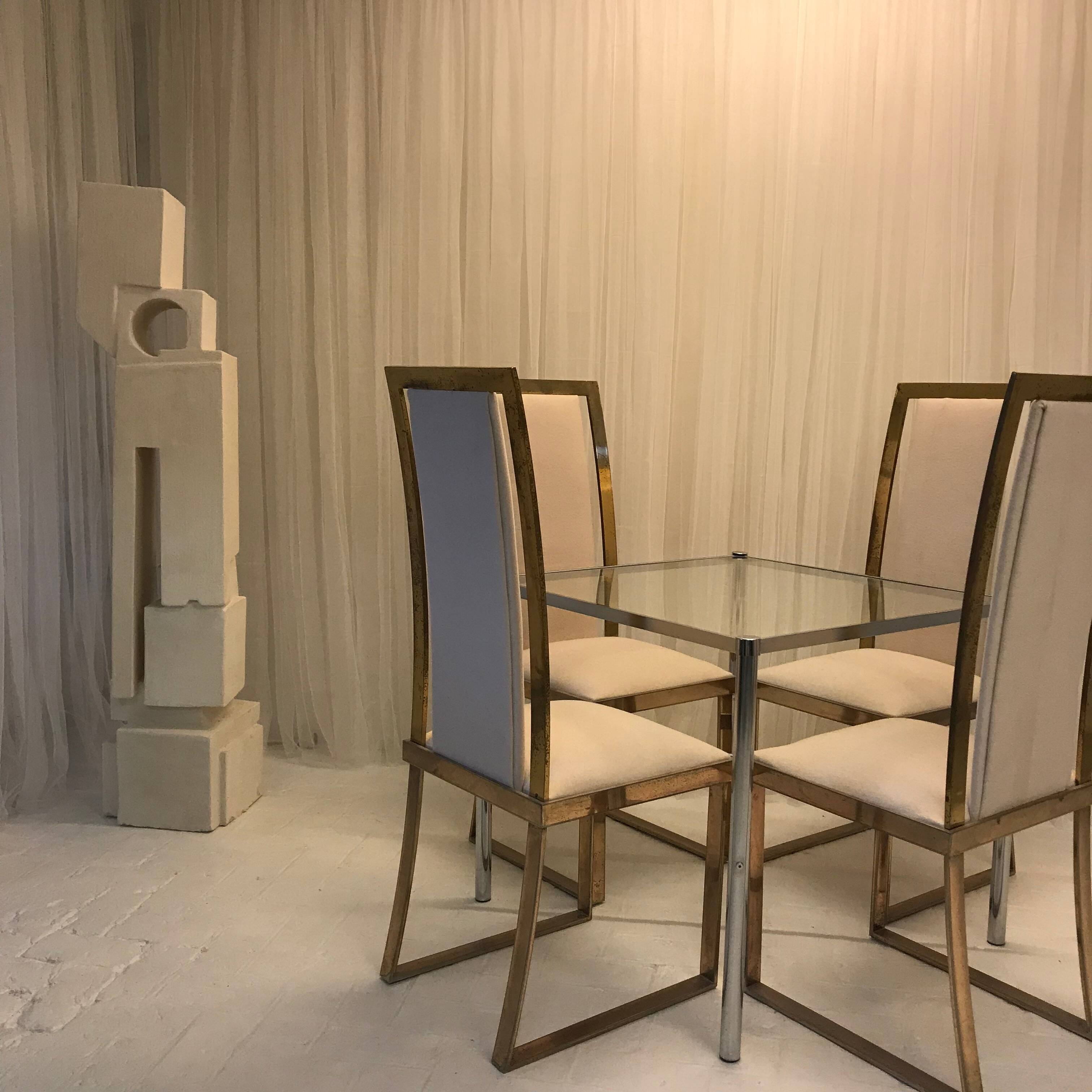 Set of 2 Michel Mangematin chairs in brass and virgin wool.