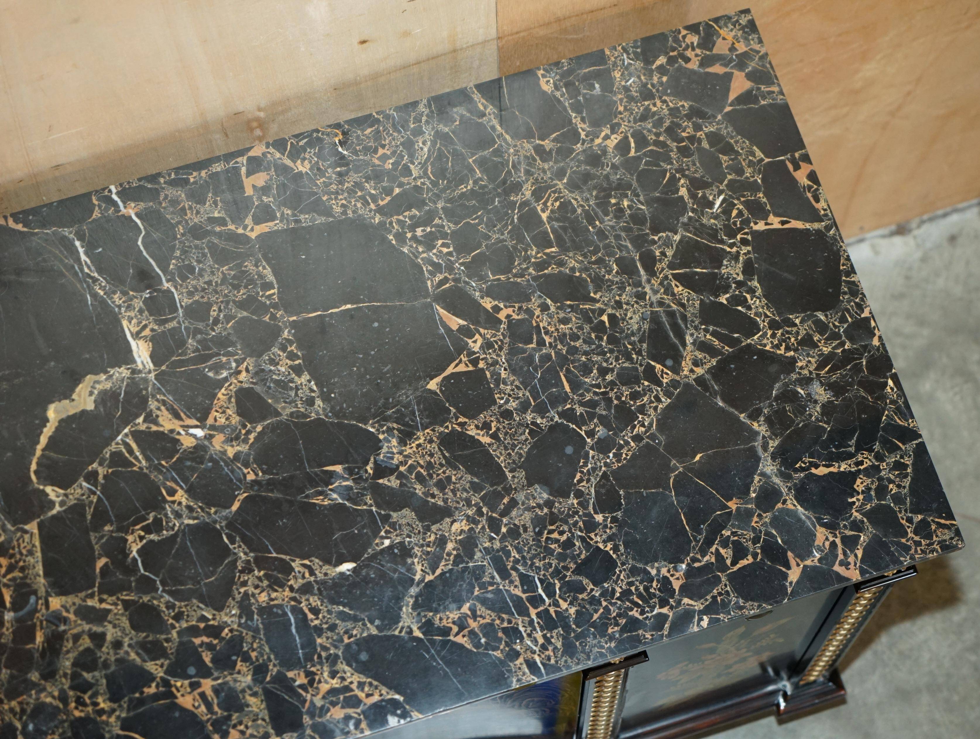 Contemporary Chinese buffet with a marble top and space for a mini-fridge.