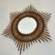 Rattan mirror in the shape of a star.