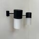 Pair of vintage adjustable wall lights, matte black metal and opaline glass, France 1950