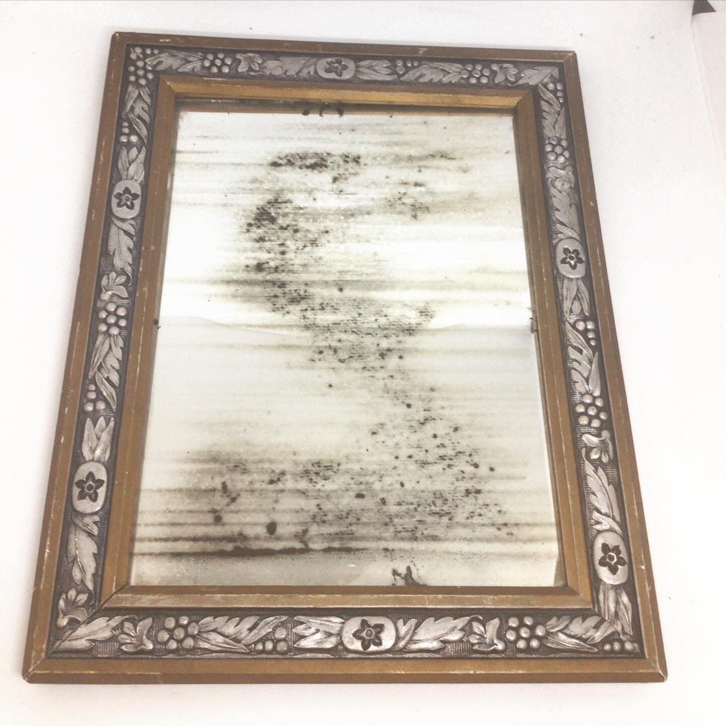 Miroir fleuri doré et argenté