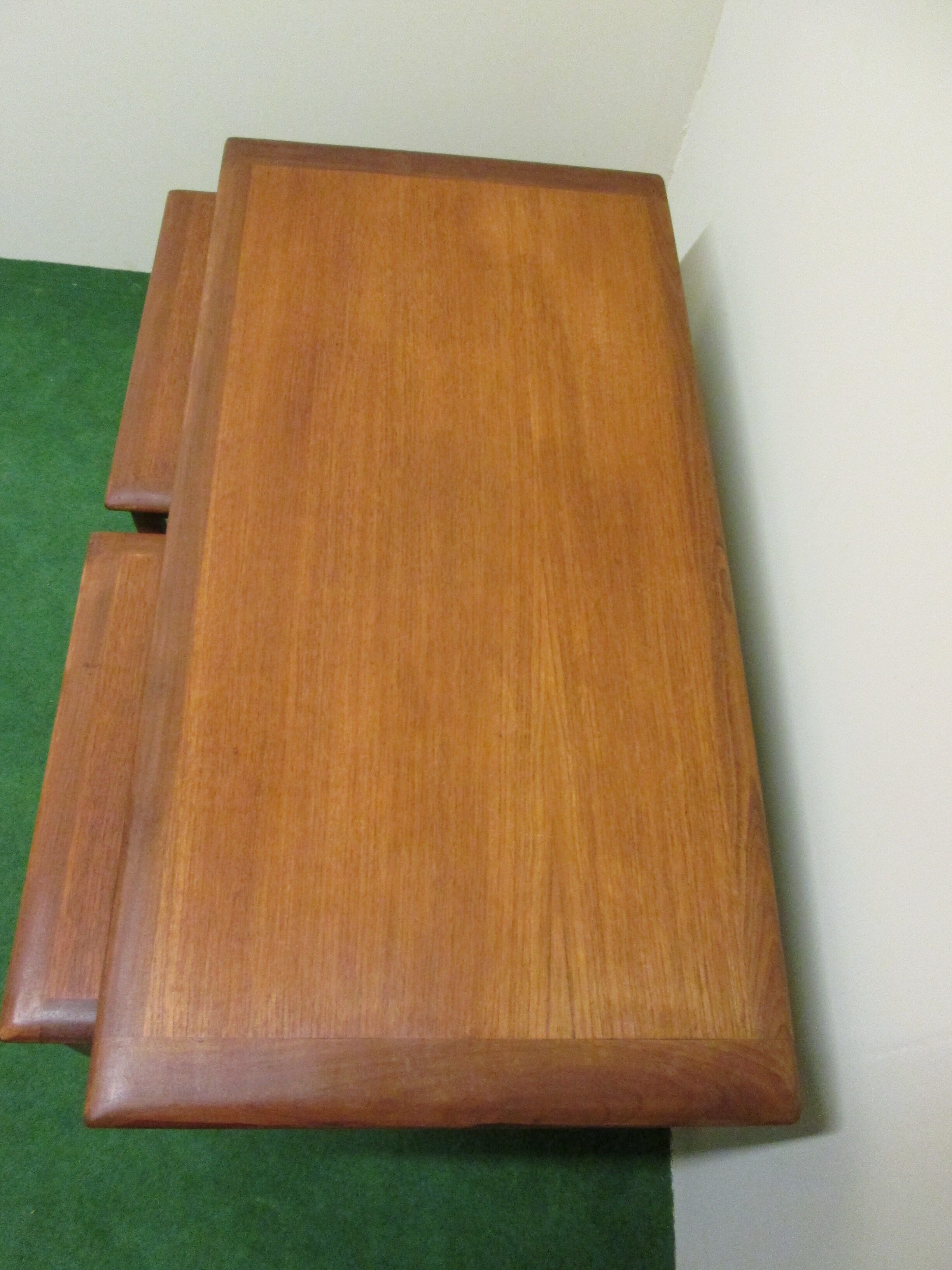 Nesting coffee tables in teak