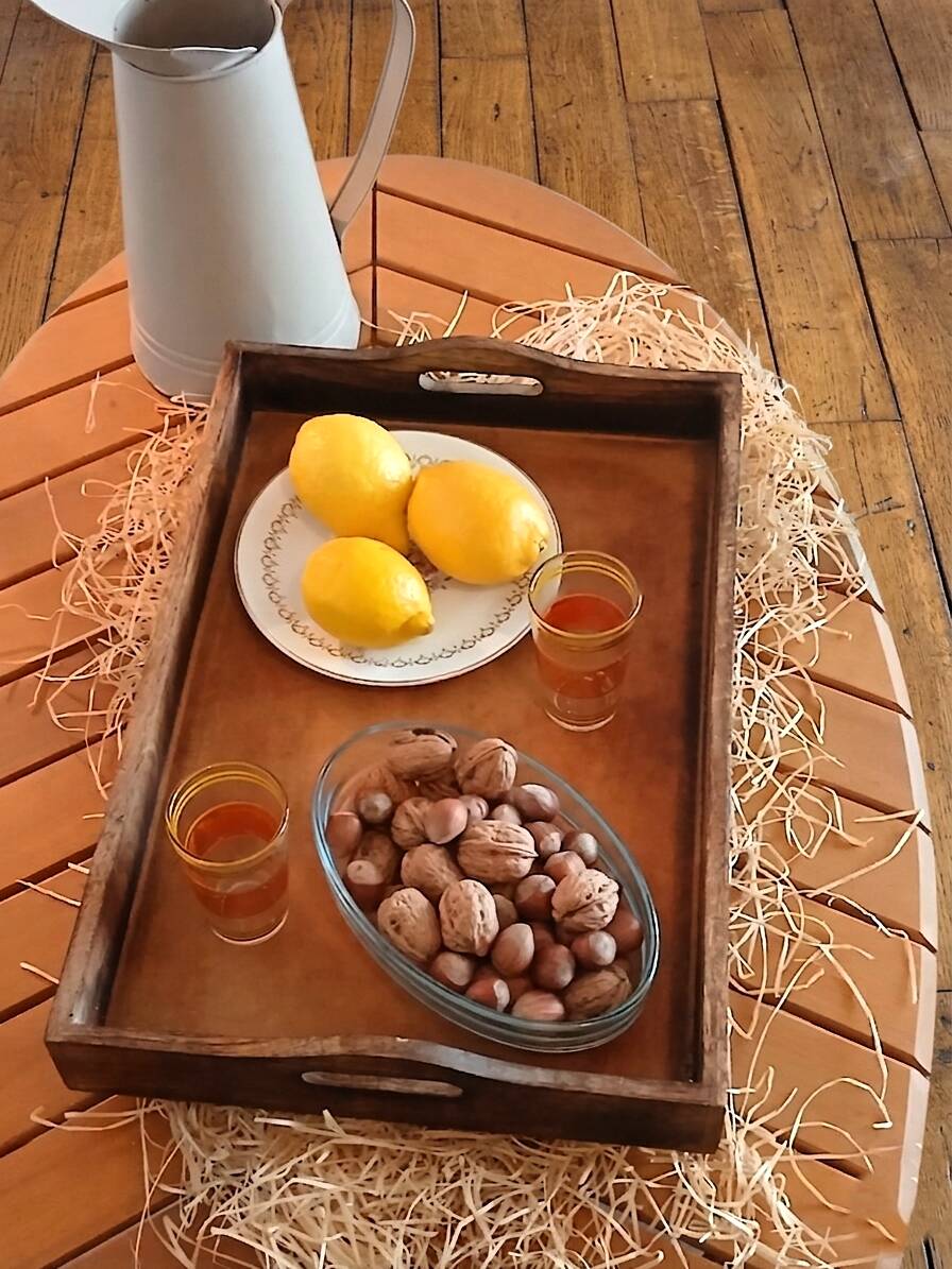 Vintage handcrafted service platter in carved and inlaid wood, India.