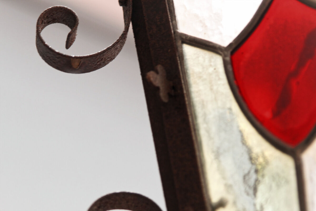 Wrought iron lantern and stained glass windows