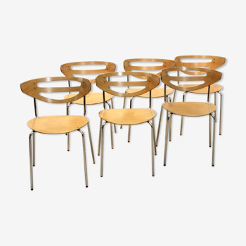 Thonet curved dining chairs stacked in chrome and beech