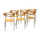 Thonet curved dining chairs stacked in chrome and beech
