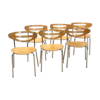 Thonet curved dining chairs stacked in chrome and beech