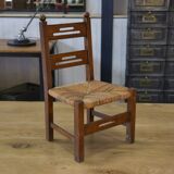 Children's wooden chair with straw seat