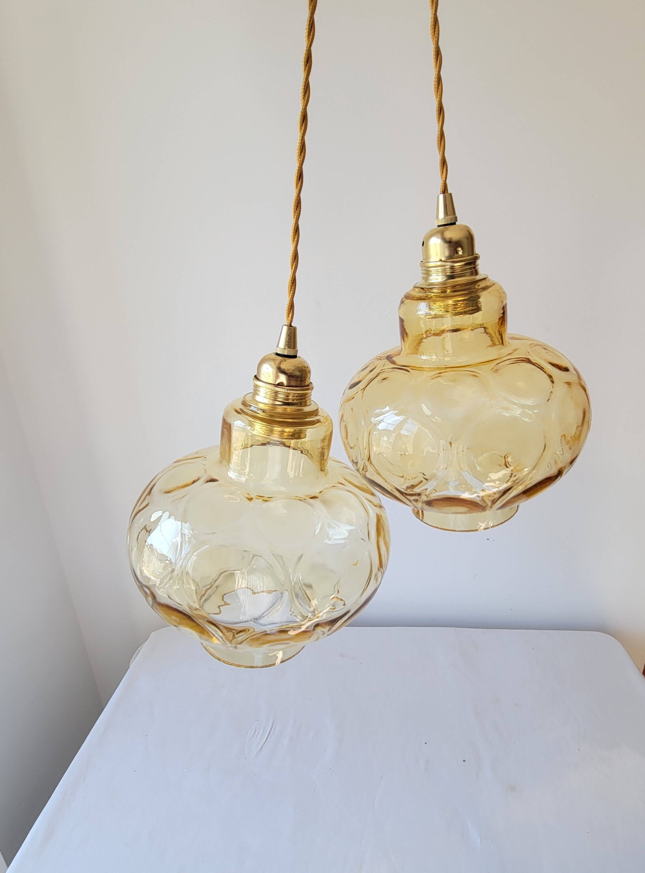 Duo of amber glass pendant lights
