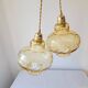 Duo of amber glass pendant lights