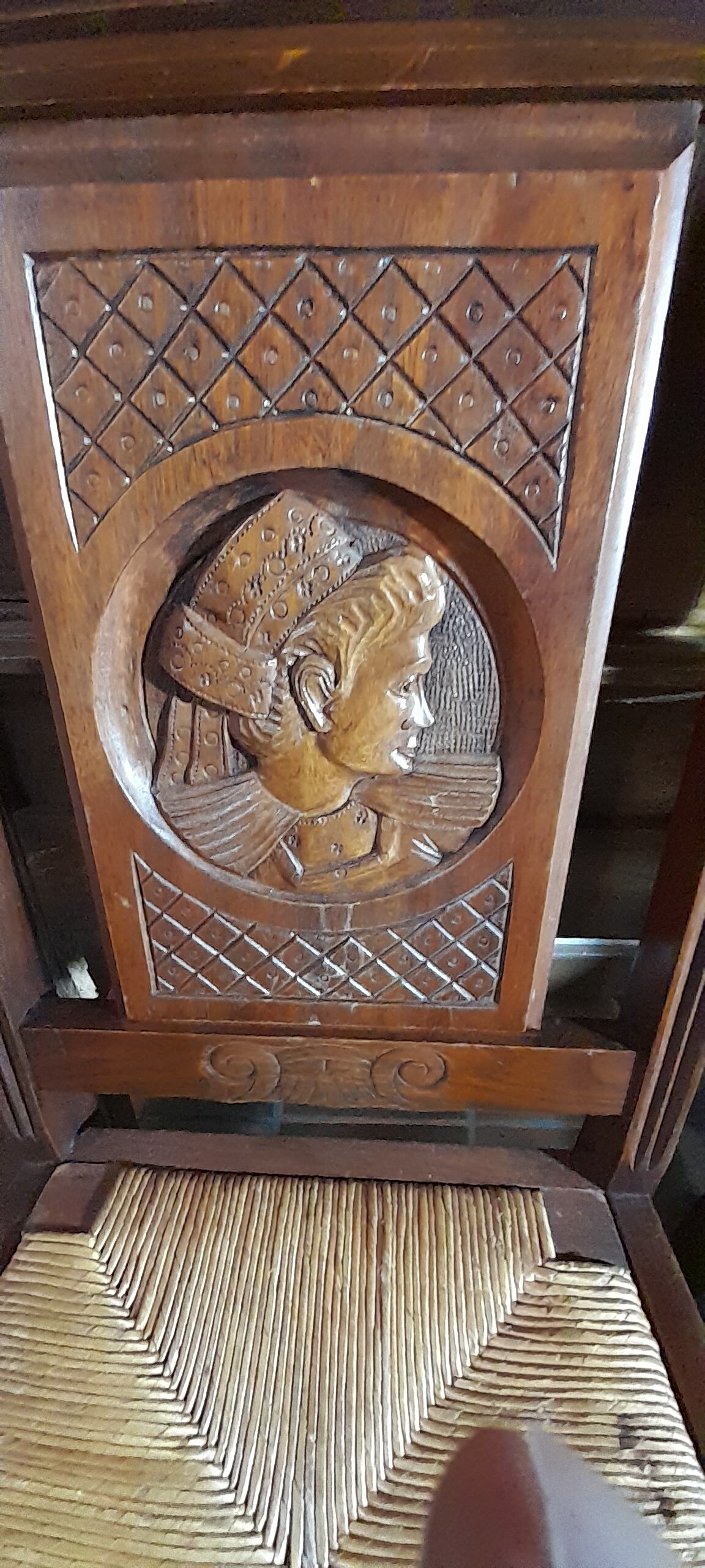 Breton dining room table with 2 extensions and 6 chairs with carved Breton characters