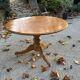 Round pine table with a diameter of 120 cm.